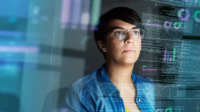 Person working at a computer in a digital interface